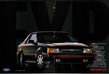 1986 FORD ESCORT EXP Black 2-door Coupe Centerfold Vintage Ad 