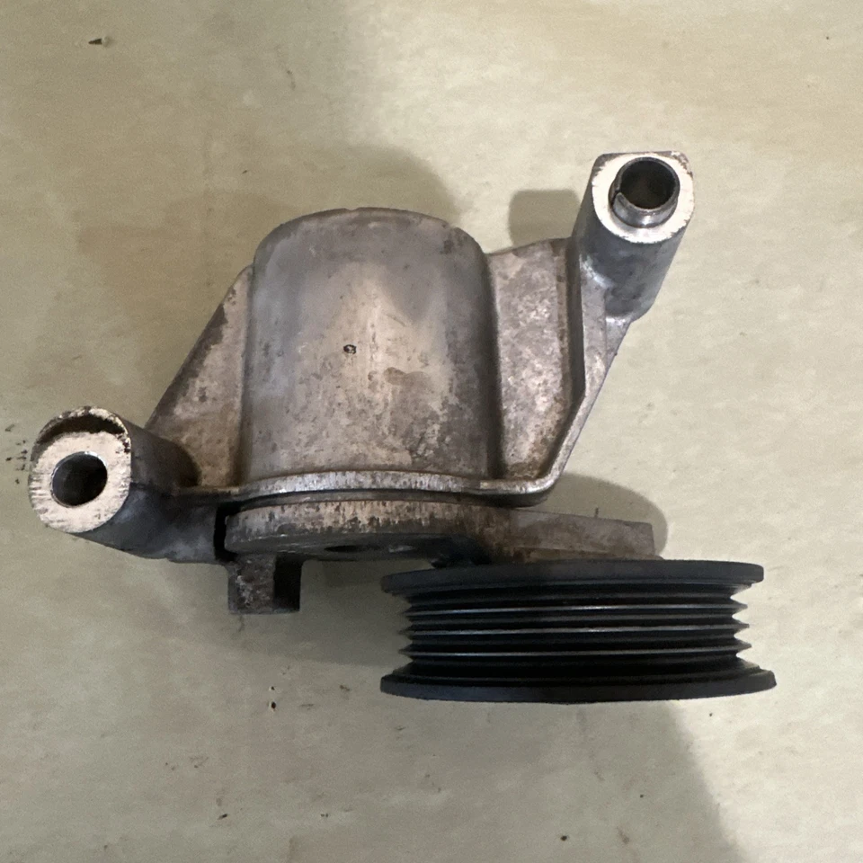 Tensor de correa de motor Ford 2,0 L 2,5 L Edge Fusion Transit Connect OEM DS7Z6A228A Foto 4 de 4