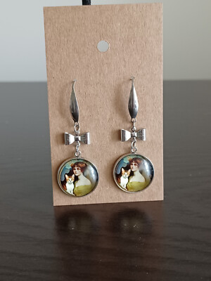lady and her cat silver dangle bow earrings