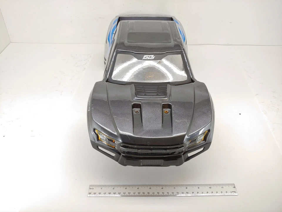 CRACKS: Silver/Gray Proline Ford Raptor Painted Body for Traxxas X-Maxx - Image 2 of 4