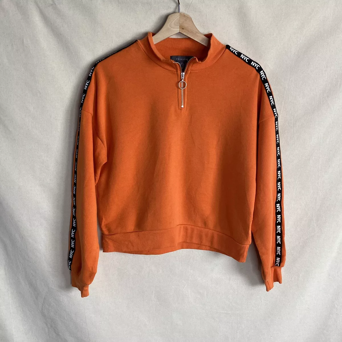 Primark shop orange jumper