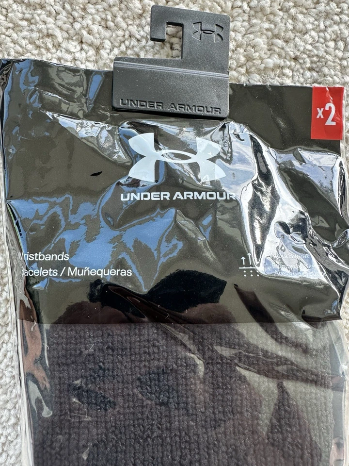 Paquete de 2 pulseras de rendimiento Under Armour para adultos de 6 pulgadas talla única negras Foto 2 de 4