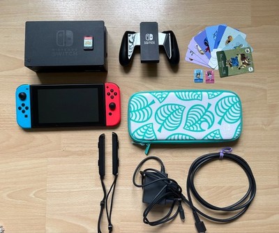 Nintendo Switch Konsole + Animal Crossing : New Horizons + 11 Amiibo Karten