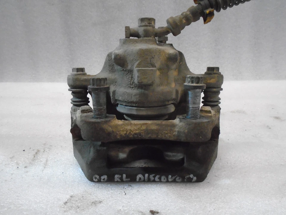 Pinza de freno trasera izquierda lado del conductor Land Rover Discovery 1999-2004 OEM VI611207 Foto 2 de 4