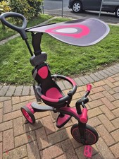 Children's  4  in 1  pink  Trike  with parent  handle  ( 10- 40 months ) 