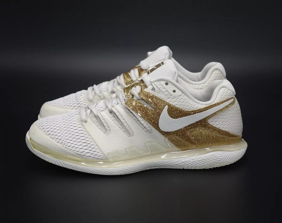 Gold nike top tennis shoes