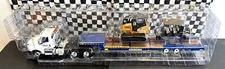 United Rentals International Truck & Flatbed Trlr. w/Case 750M+Club Car-1:34 MIB