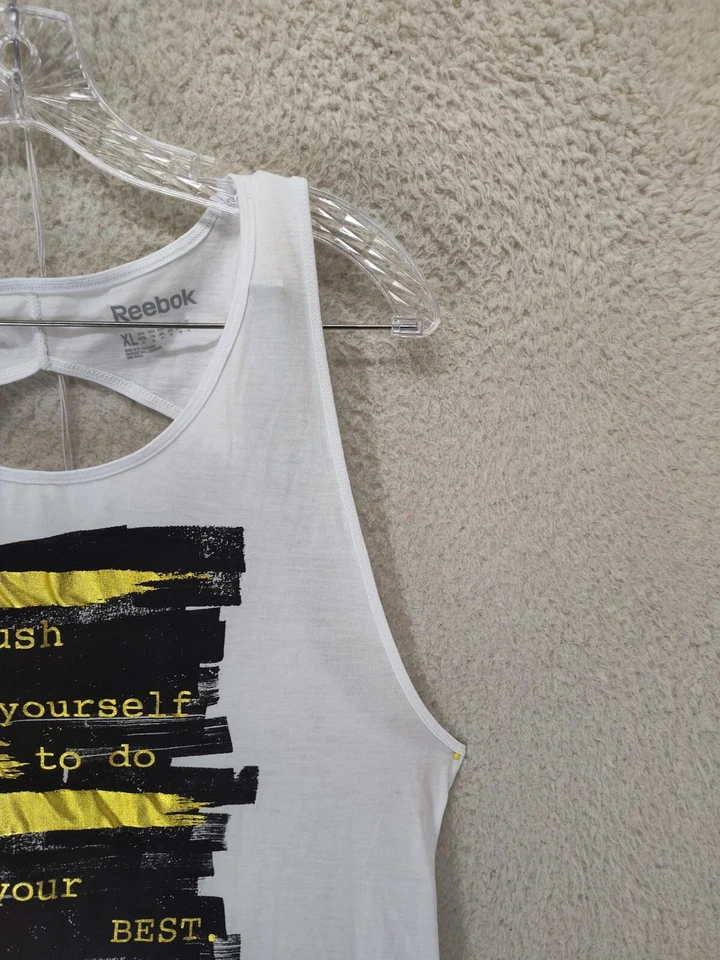 Camiseta sin mangas Reebok para mujer extra grande blanca mezcla de polietileno sin mangas recortada ropa deportiva Foto 3 de 4
