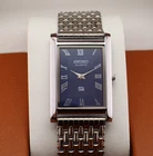 Vintage Seiko Slim Quartz Men's Wrist Watch Blue Dial with Silver Bracelet.