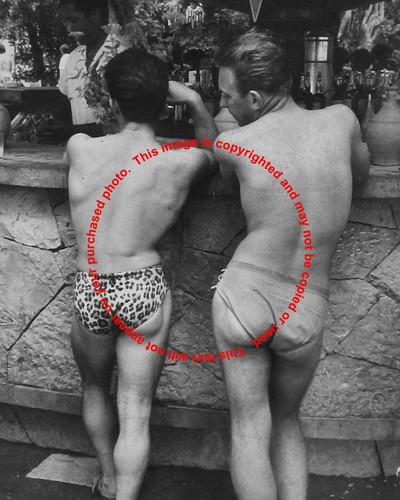 2 Guys in the 1960s Standing at a Pool Bar