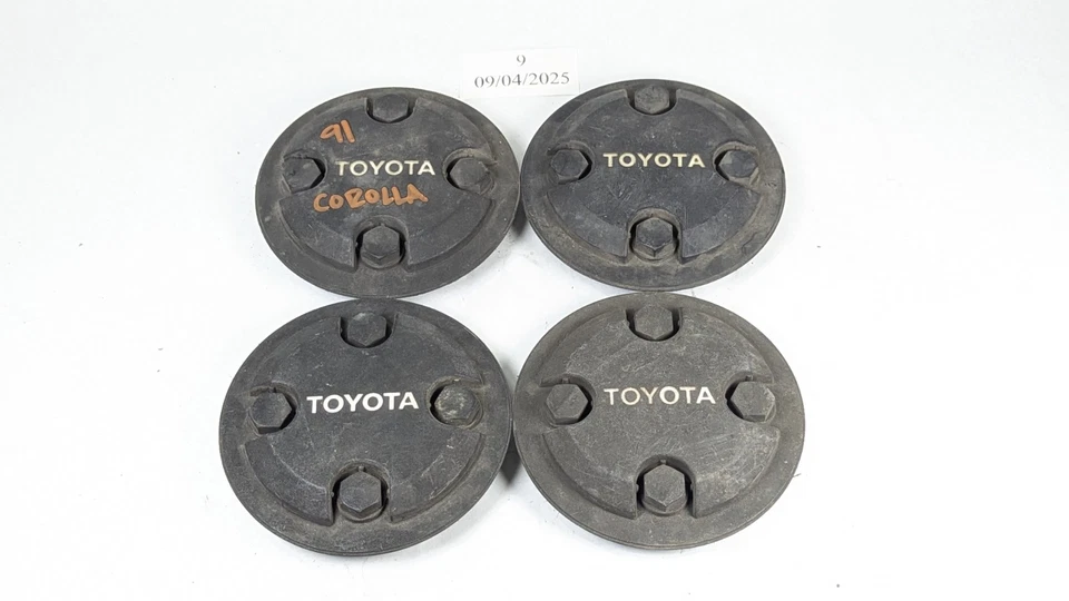 Juego de 4 tapas centrales negras Toyota Corolla Tercel 1986-1992 716814 OEM originales Foto 2 de 4