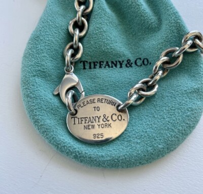 Tiffany & Co. - Vintage “Please Return To Tiffany” Oval Tag