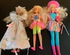 3 Vintage 11” Barbie dolls with 3 different outfits all blonde