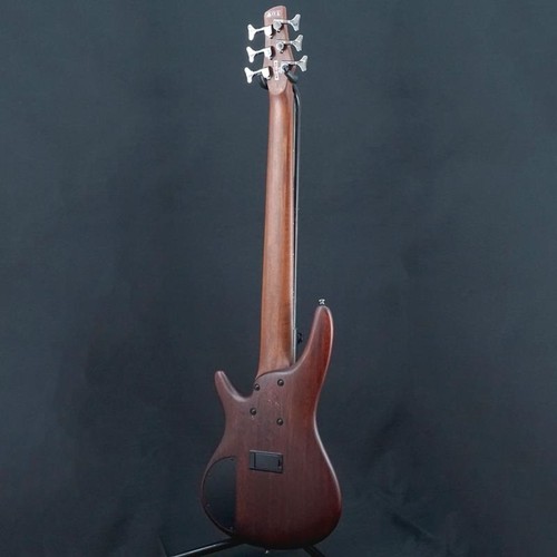 Brown Ibanez SR506-BM bass with silver hardware, six-string scale, and glossy finish on dark back.
