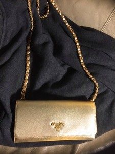 prada gold purse