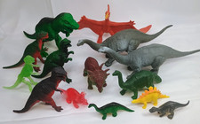 Dinosaur Lot of 14 plastic  PVC T- Rex Pterodactyl Tricaratops Titanosaurd