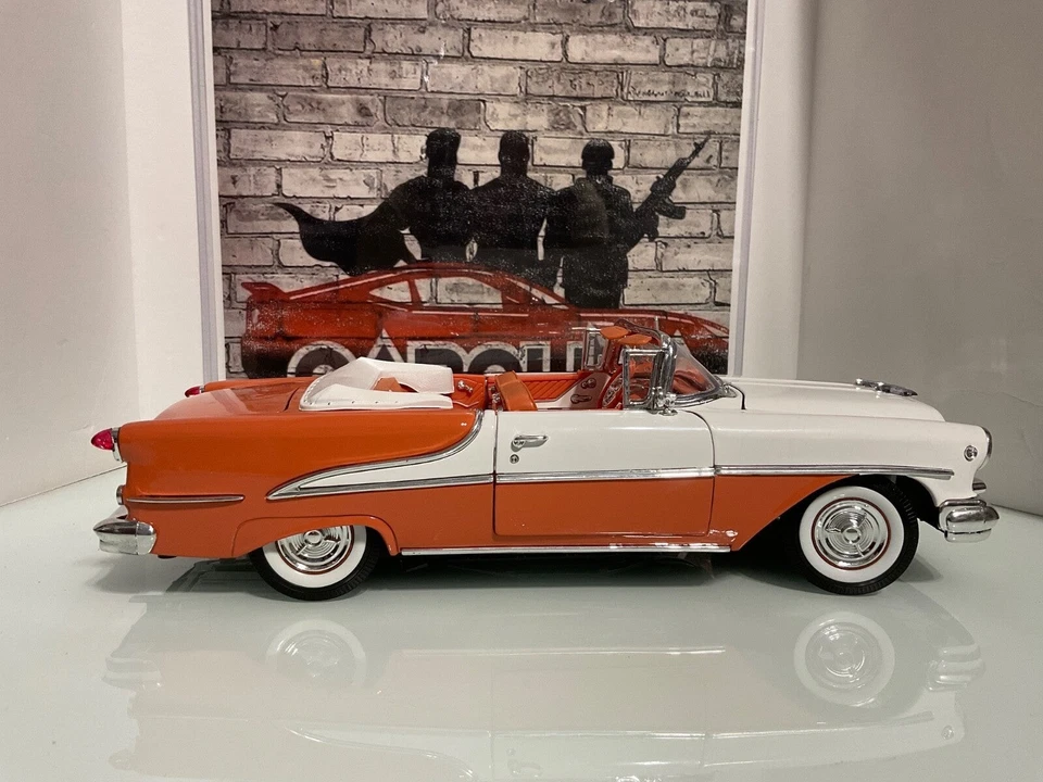 1:18 WELLY 1955 OLDSMOBILE SUPER 88 CORAL SPIDERING ON HOOD SEE PIC - Image 2 of 4