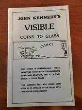 John Kennedy's Visible Coins To Glass