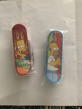 The Simpsons 2x Skateboards Kellogg  s 2003 Homer Bart Promotional Toys New