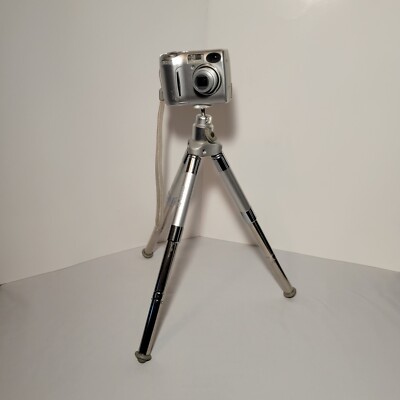 Slver Nikon Coolpix E 4600  Zoom Digital Camera with mini D tabletop tripod