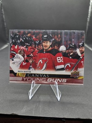 2022-23 Upper Deck Series 2 - Ud Canvas Young Guns Nikita Okhotyuk #C221 (RC)