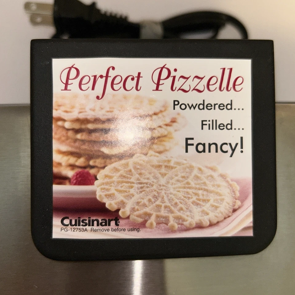 Prensa de oblea para galletas Cuisinart Perfect Pizzelle acero inoxidable WM-PZ2 120v usada Foto 2 de 4
