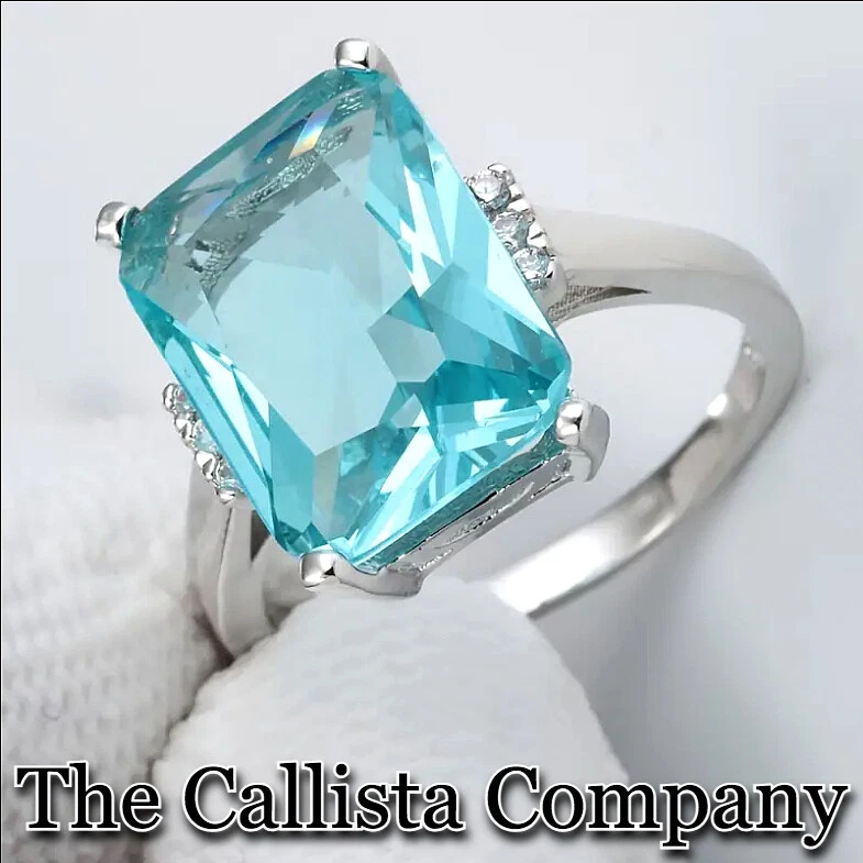 THE CALLISTA CO. CREADO EN LABORATORIO 6,0 CT CORTE ESMERALDA AZUL CIELO 5A+ CIRCONITA PLATEADA RG TALLA 5-9 Foto 2 de 4