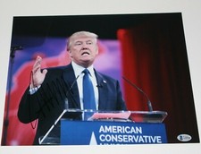 PRESIDENT DONALD J. TRUMP SIGNED 11x14 PHOTO 1 BECKETT COA 45 MAKE AMERICA GREAT