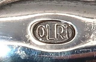 Abridor de botellas de plata vintage OLRI para Neiman Marcus, acero inoxidable, 6" Foto 4 de 4