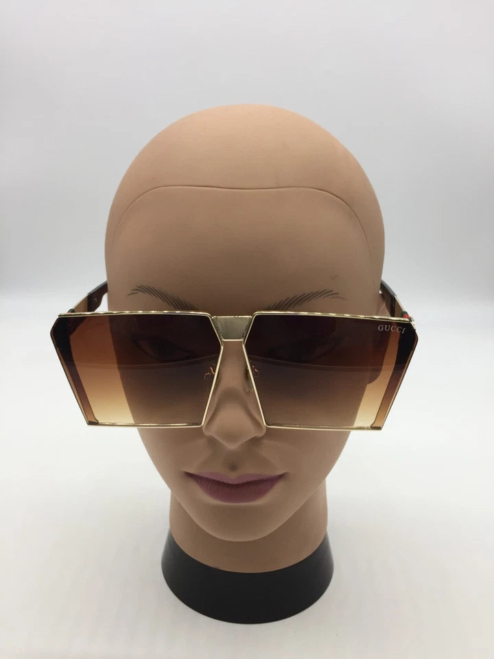 Gafas de sol Gucci para mujer con montura dorada de borde completo 52-16-145 lentes marrones Foto 2 de 4