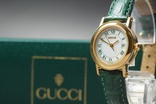 [Presque comme neuve avec boîtier] Montre femme Gucci 7200L verte 26 mm...
