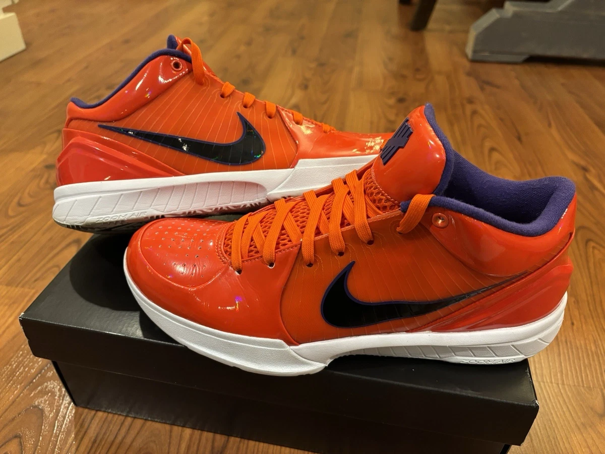Preços baixos em Nike Zoom Kobe 4 Protro x Undefeated Team Orange