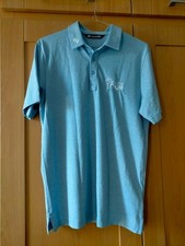 TRAVIS MATHEW Jasnoniebieska koszulka polo golfowa EUROPEAN TOUR Logo Męska Mała W bardzo dobrym stanie