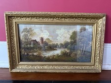 Antico dipinto olio di un paesaggio su tela con cornice dorata smaltata