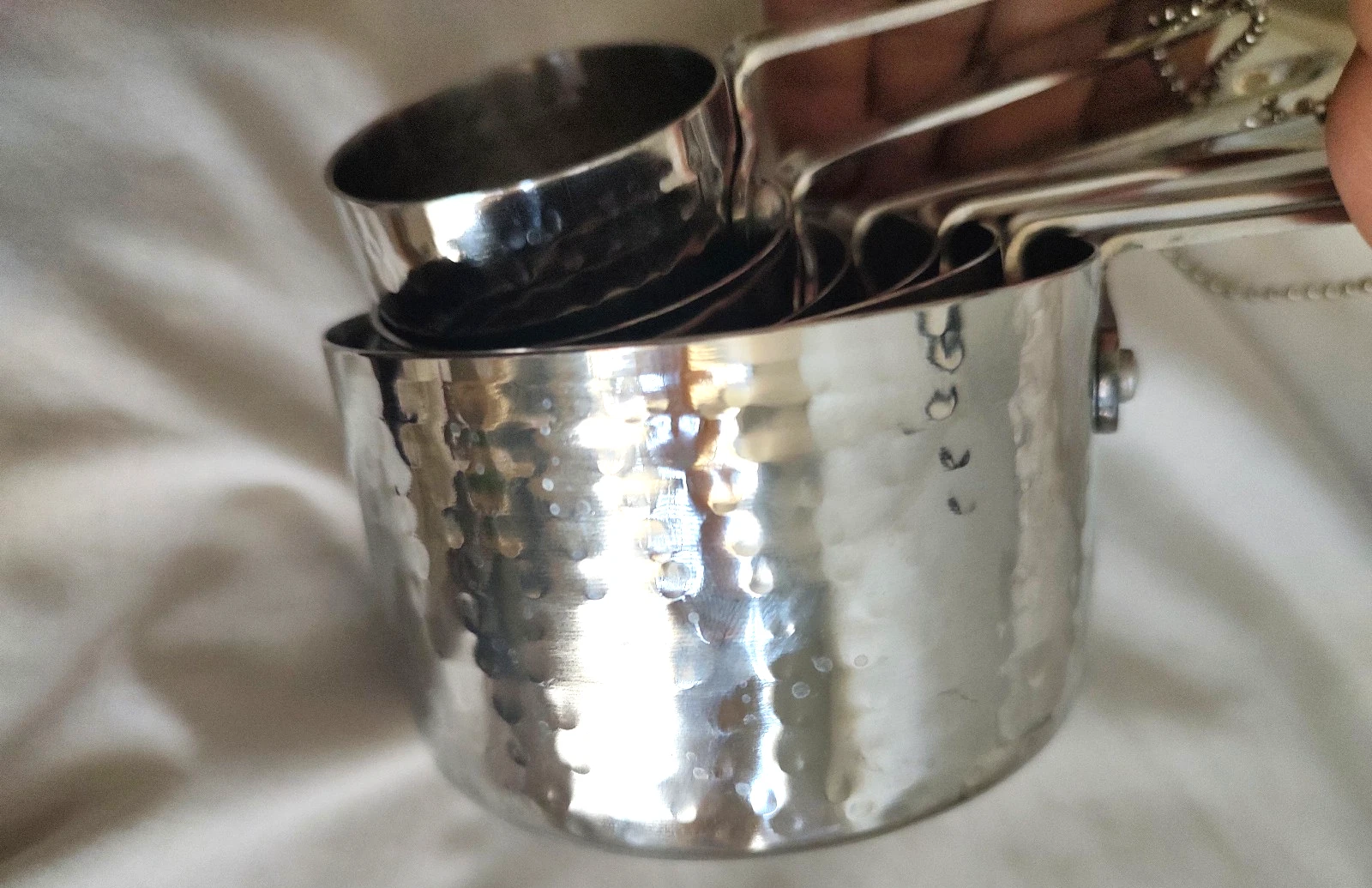 LOT OF 6 HAMMERED STAINLEES STEEL MEASURING CUPS