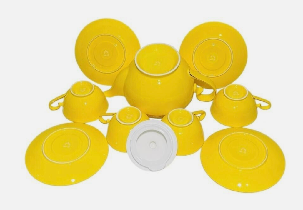 Teavana bone china tea set with real gold trim. (New but never used