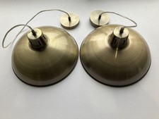 pair of polished brass overhead kitchen lamps