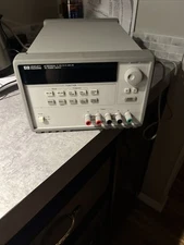 HP E3631A DC POWER SUPPLY 0-6V,5A/0- +-25V,1A M5337