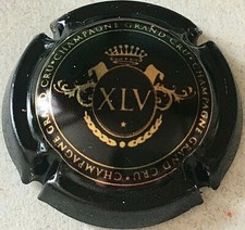 Capsule de champagne XAVIER LOUIS VUITTON (2. noir et or)