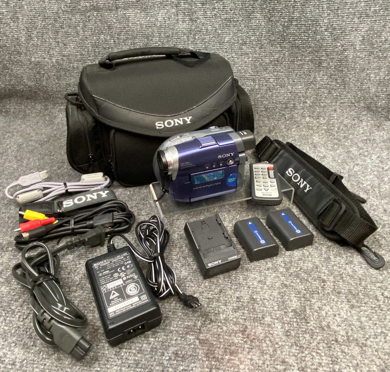 Tested 2 Batteries Charger Remote Bag