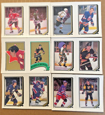 1987-88 O-Pee-Chee Lot of 12 Hockey card Album stickers.