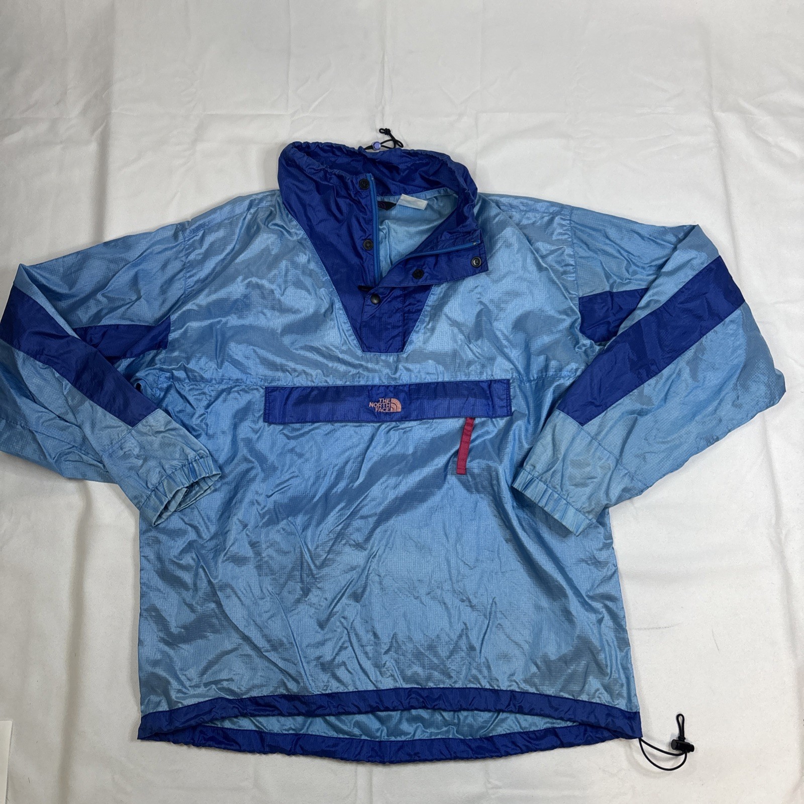 The North Face Men’s XL Light Blue Windbreaker Pullover with Stowable Hood & High Collar