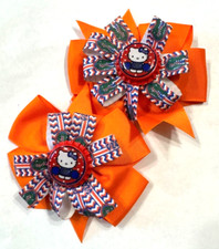 Beautiful Florida Gators Set of Pigtail hair bows for girls.