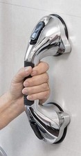 Chrome suction grab handle, which is a bathroom safety aid.  New