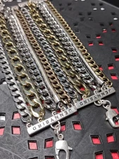 Set Of Two Matching Jenny Bird Multi Tone Layered Chain Bracelets