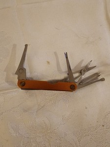 906.  Mini, Unbranded Pocket Multi Tool