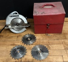 Vintage Ingersoll-Rand S24 Model F electric circular saw with blades and case