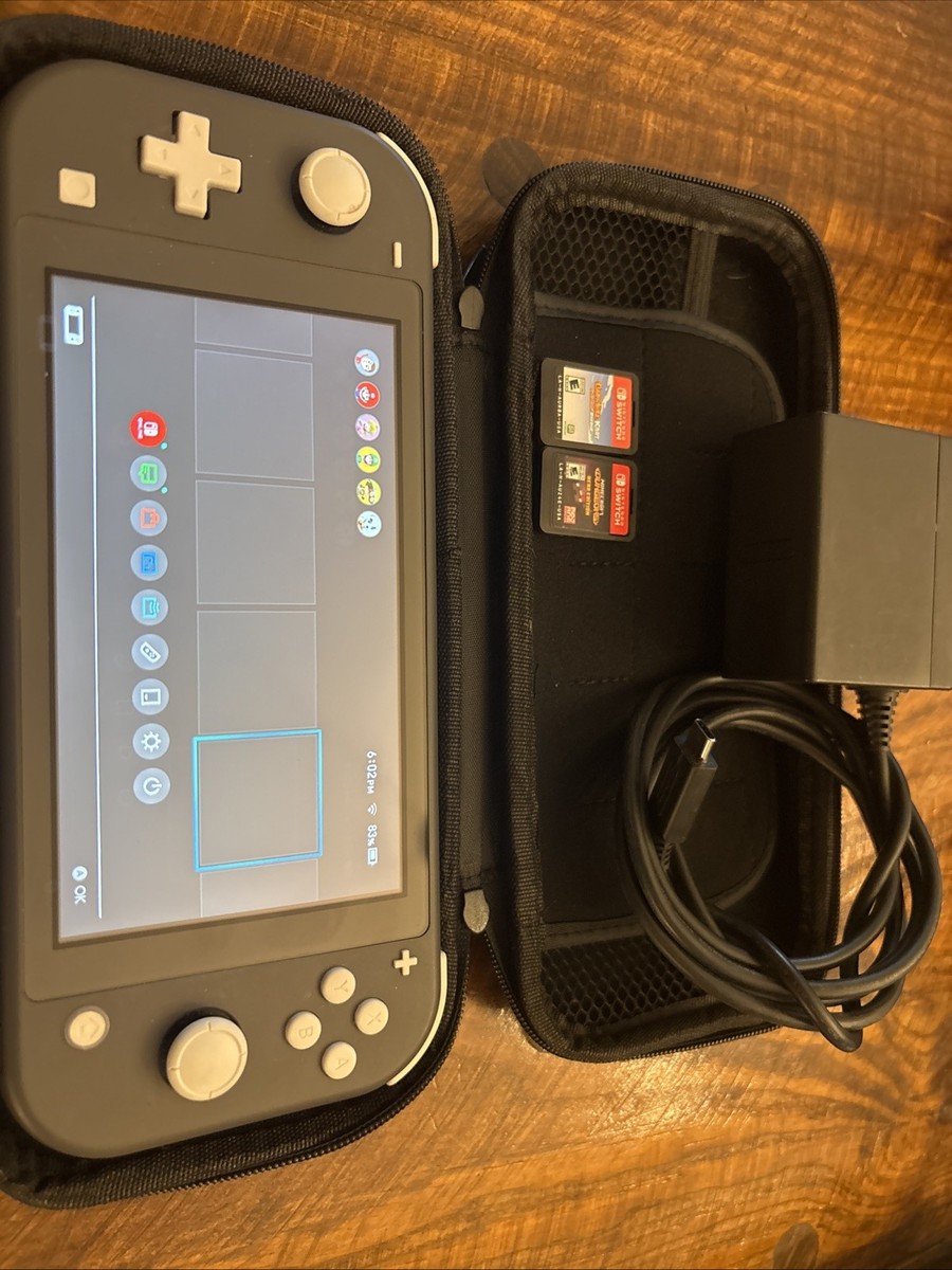 Nintendo Switch Lite HDH-001. Comes With Charger And Case. Comes