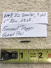 H&R 22 Special, 7shot, 22 LR , blue 6": Forward Trigger Guard Pin