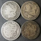 1885, 1889 O, 1900 O, and 1901 O $1 Morgan Silver Dollars